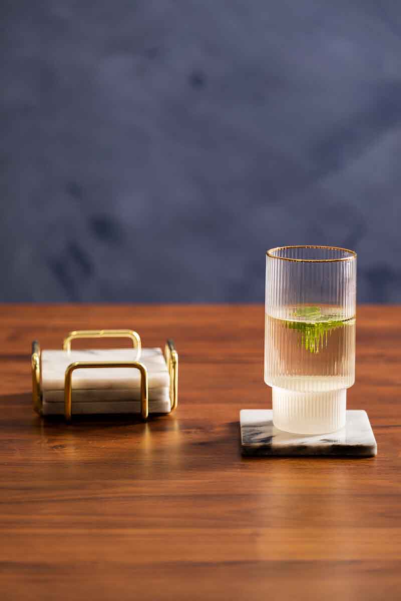 Delphine Set Of 4 White Marble Coasters with Brass Finish Holder
