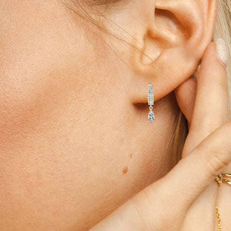 Illuminess™ Sterling Silver Floating Moissanite Huggies