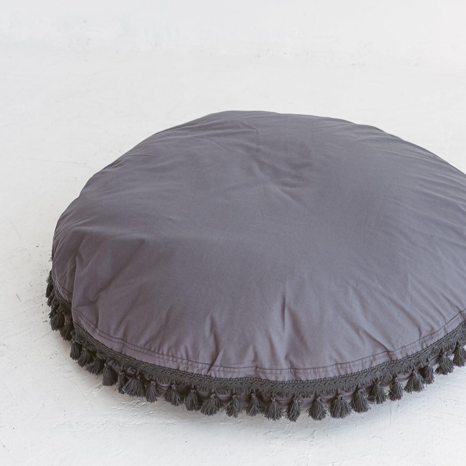 MINICAMP Large Floor Cushion with Tassels in Grey