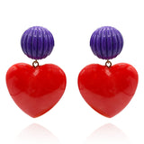 Amour Carved Purple Clip Resin With Ruby Red Resin Heart Drop