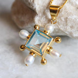 Blue Topaz Cross Necklace