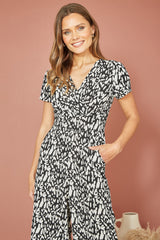 Yumi Black And White Wrap Over Stretch Jumpsuit