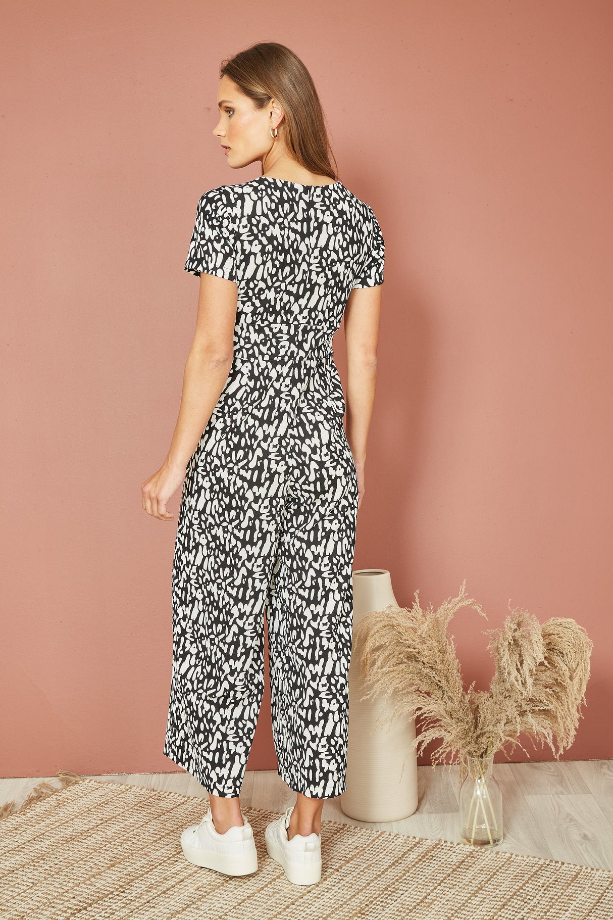 Yumi Black And White Wrap Over Stretch Jumpsuit