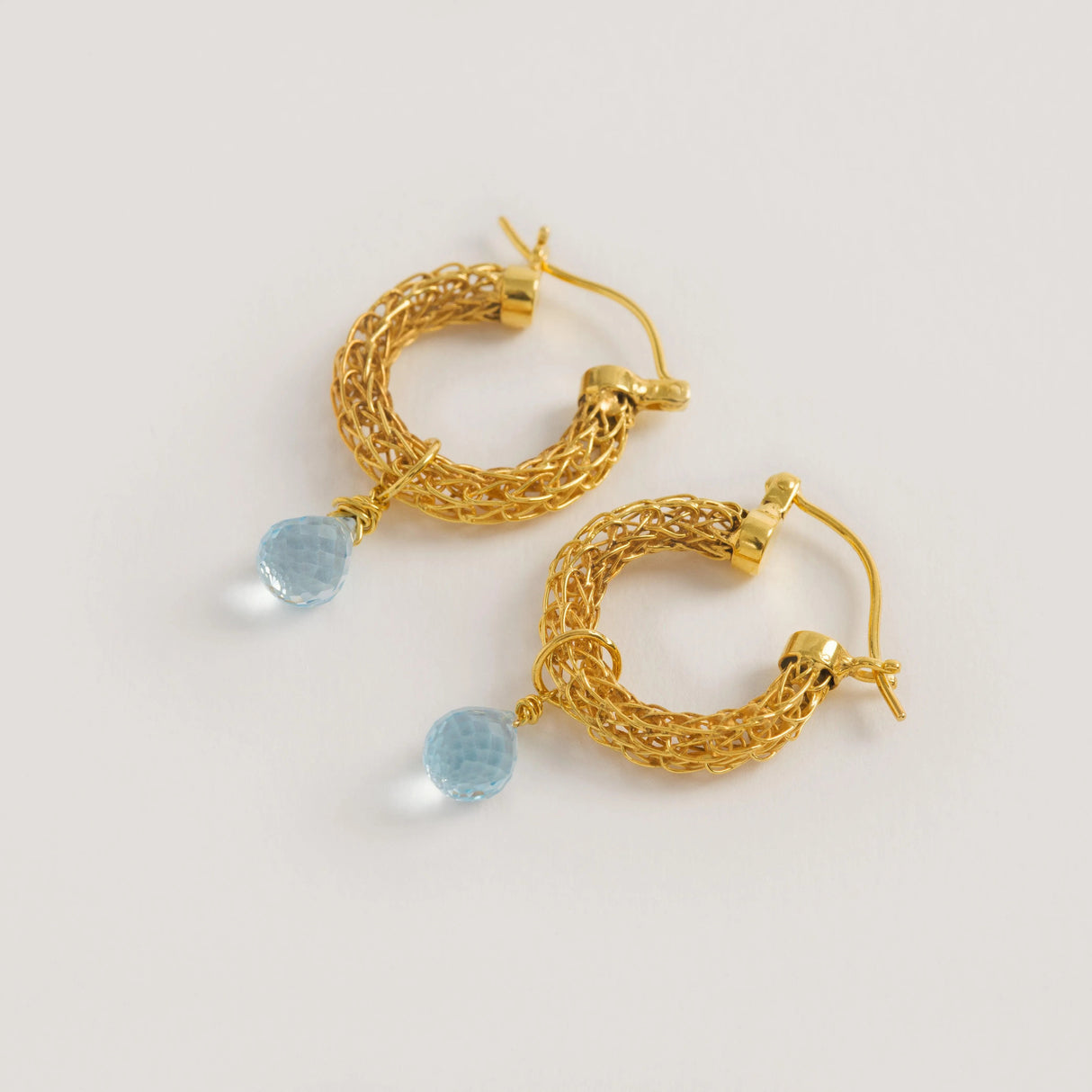 Gold Weave Mini Hoops With Blue Topaz Charm
