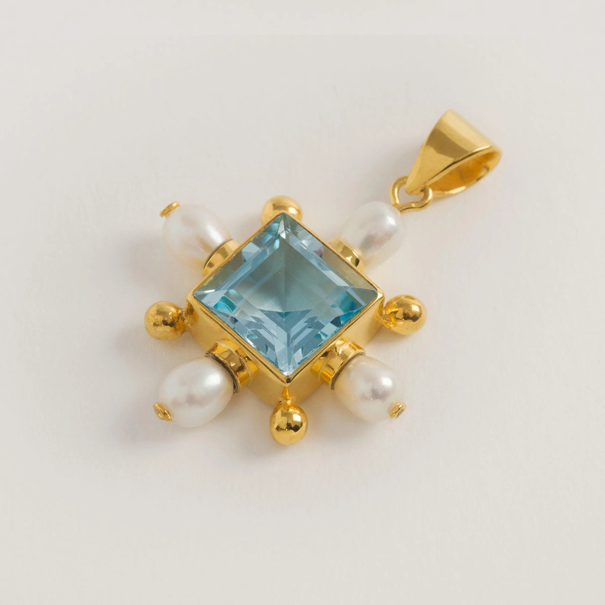 Blue Topaz Cross Pendant