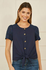 Yumi Navy Jersey Button Detail T-Shirt With Broderie Anglaise Sleeves And Tie Front