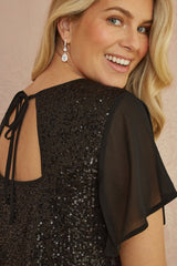 Yumi Black Sequin Top With Sheer Sleeves And Cut Out Back