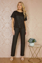 Yumi Black Sequin Top With Sheer Sleeves And Cut Out Back
